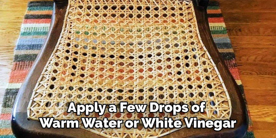 Apply a Few Drops of
Warm Water or White Vinegar