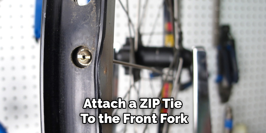 Attach a ZIP Tie 
To the Front Fork