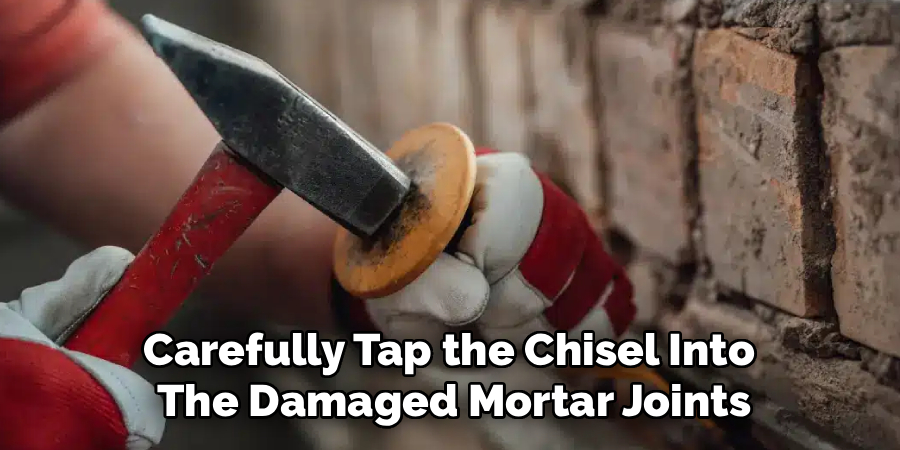 Carefully Tap the Chisel Into 
The Damaged Mortar Joints