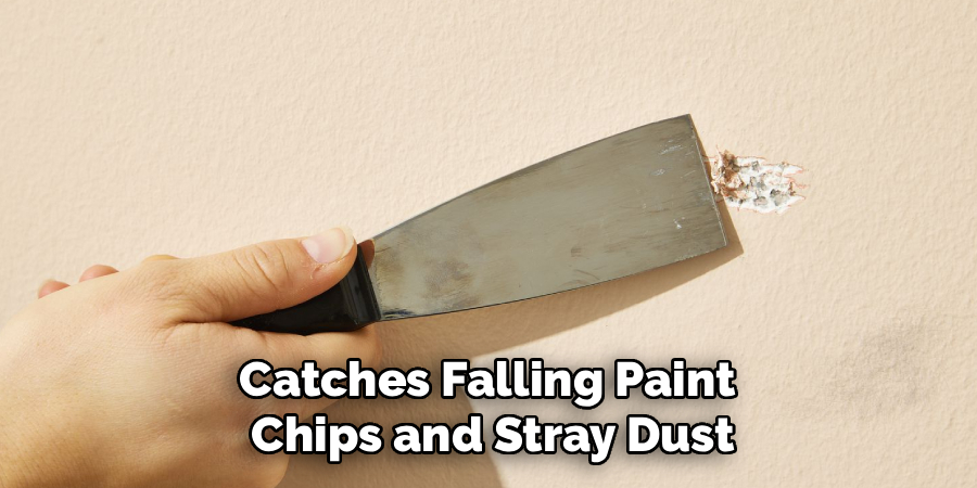 Catches Falling Paint 
Chips and Stray Dust