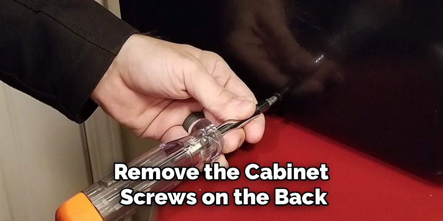 Remove the Cabinet 
Screws on the Back