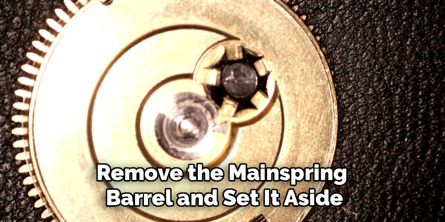 Remove the Mainspring
Barrel and Set It Aside