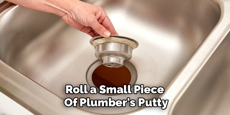 Roll a Small Piece
Of Plumber's Putty