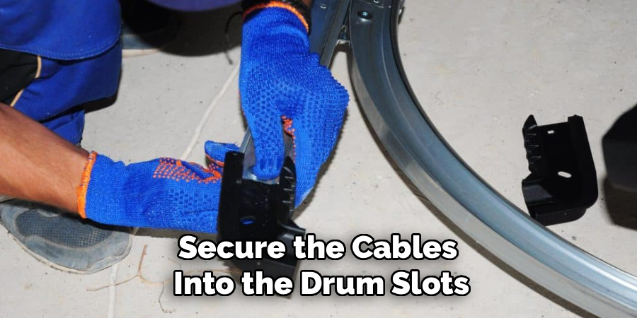 Secure the Cables 
Into the Drum Slots