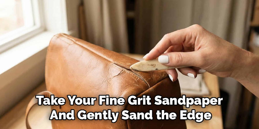 Take Your Fine Grit Sandpaper
And Gently Sand the Edge