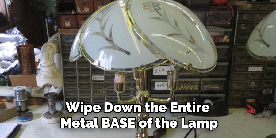 Wipe Down the Entire
Metal BASE of the Lamp