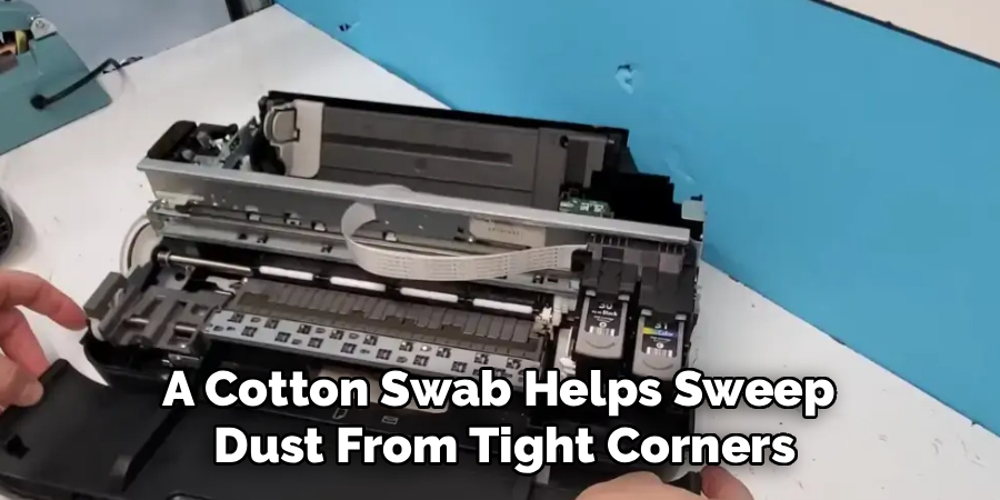 A Cotton Swab Helps Sweep
Dust From Tight Corners