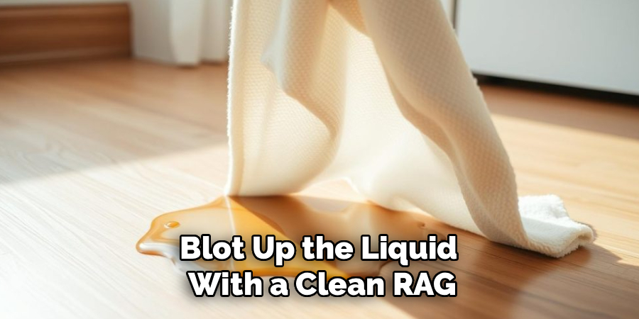 Blot Up the Liquid
With a Clean RAG