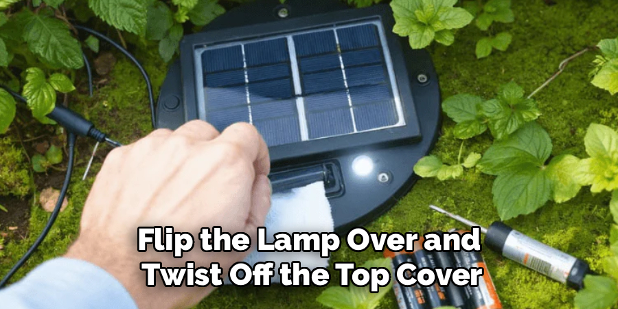 Flip the Lamp Over and
Twist Off the Top Cover