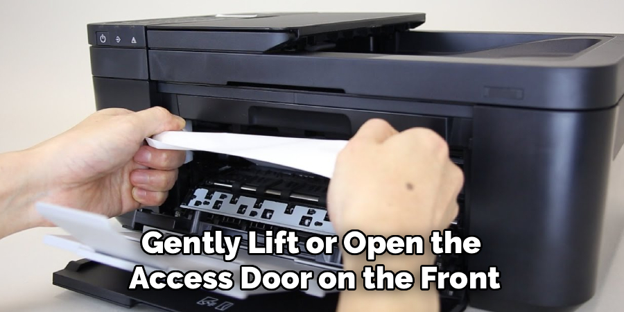 Gently Lift or Open the
Access Door on the Front