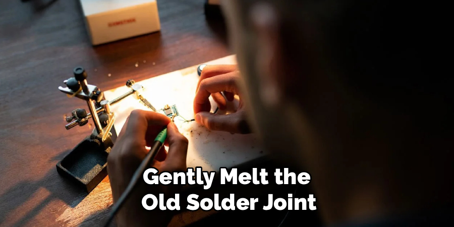 Gently Melt the
Old Solder Joint