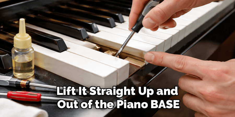 Lift It Straight Up and
Out of the Piano BASE