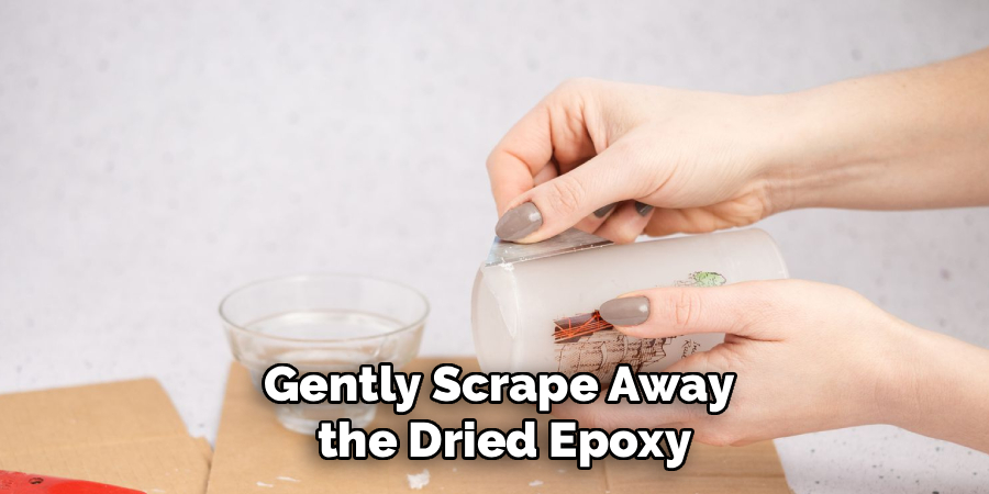 Gently Scrape Away
the Dried Epoxy
