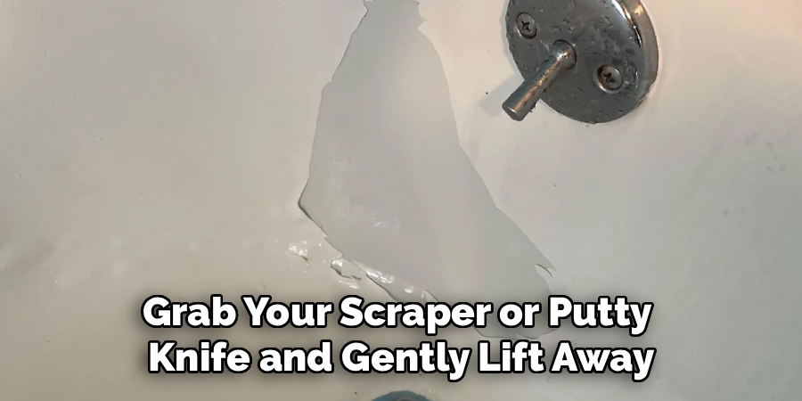 Grab Your Scraper or Putty
Knife and Gently Lift Away