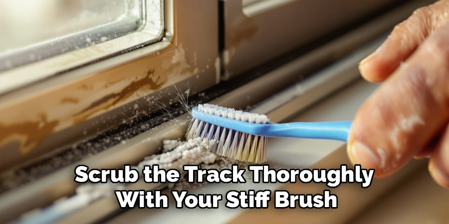 Scrub the Track Thoroughly
With Your Stiff Brush