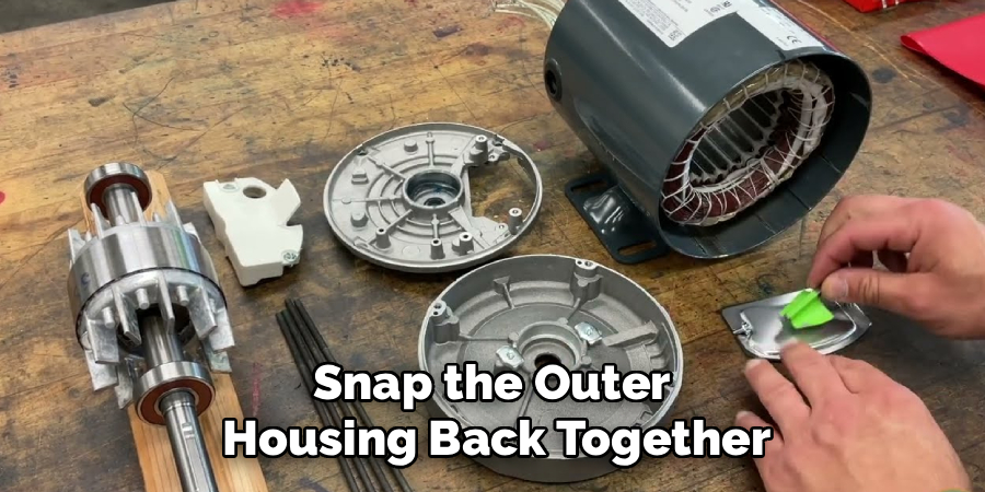 Snap the Outer
Housing Back Together