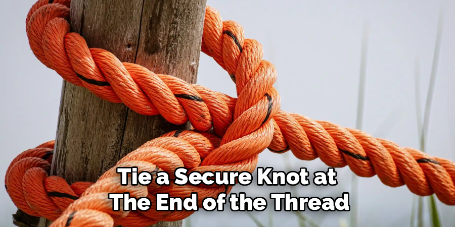 Tie a Secure Knot at
The End of the Thread