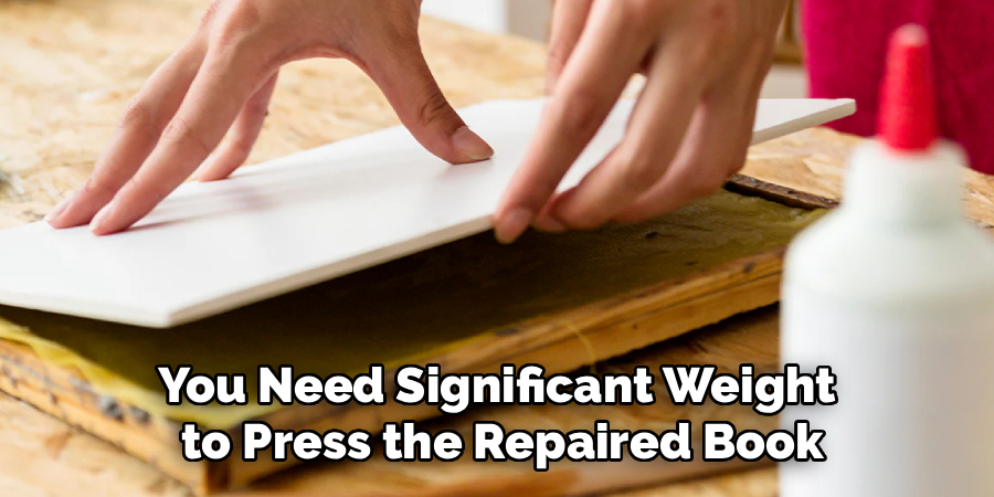 You Need Significant Weight
 to Press the Repaired Book