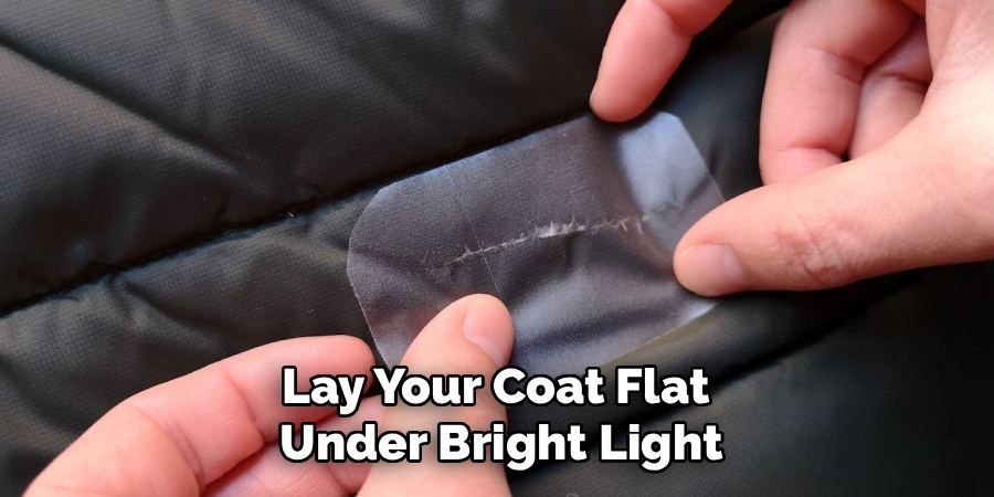 Lay Your Coat Flat 
Under Bright Light