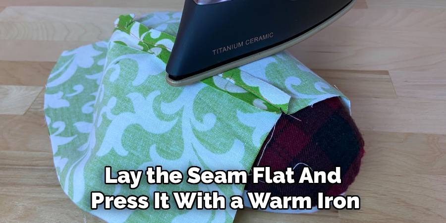 Lay the Seam Flat And
 Press It With a Warm Iron